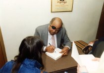 James Farmer at book signing